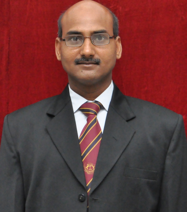 Dr Kamlendra Kumar