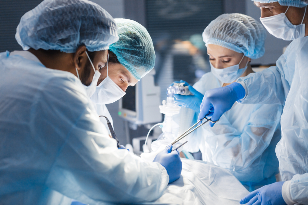 Concentrated,Surgical,Team,Operating,A,Patient,In,An,Operation,Theater